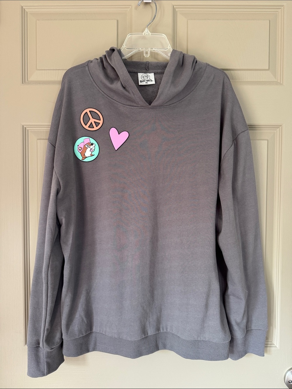Women's Gray Hooded Sweatshirt with Playful Patch Accents